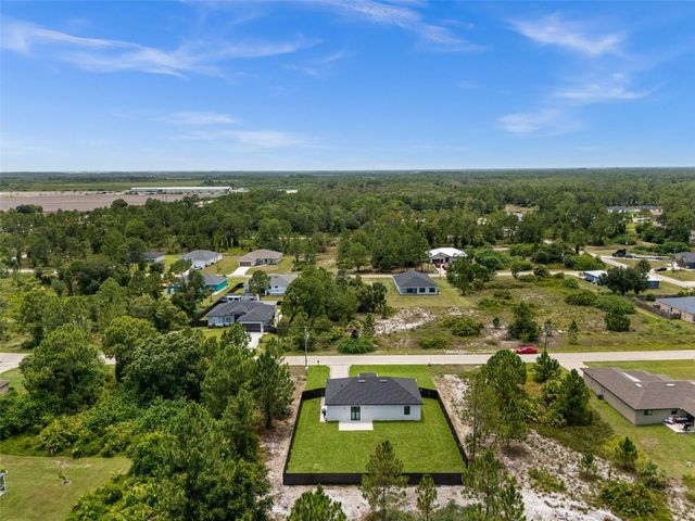 1039 BASSINGER AVENUE S, Lehigh Acres, FL 33974