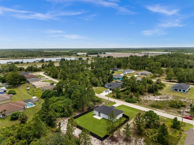 1039 BASSINGER AVENUE S, Lehigh Acres, FL 33974