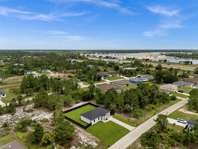 1039 BASSINGER AVENUE S, Lehigh Acres, FL 33974