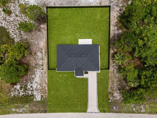 1039 BASSINGER AVENUE S, Lehigh Acres, FL 33974