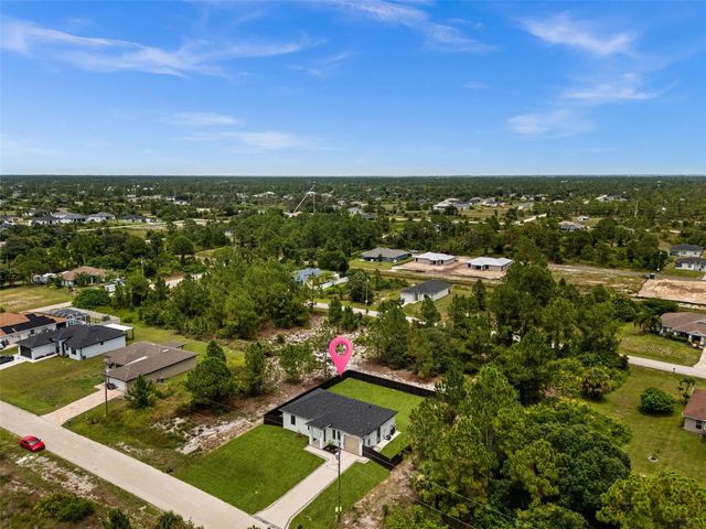 1039 BASSINGER AVENUE S, Lehigh Acres, FL 33974