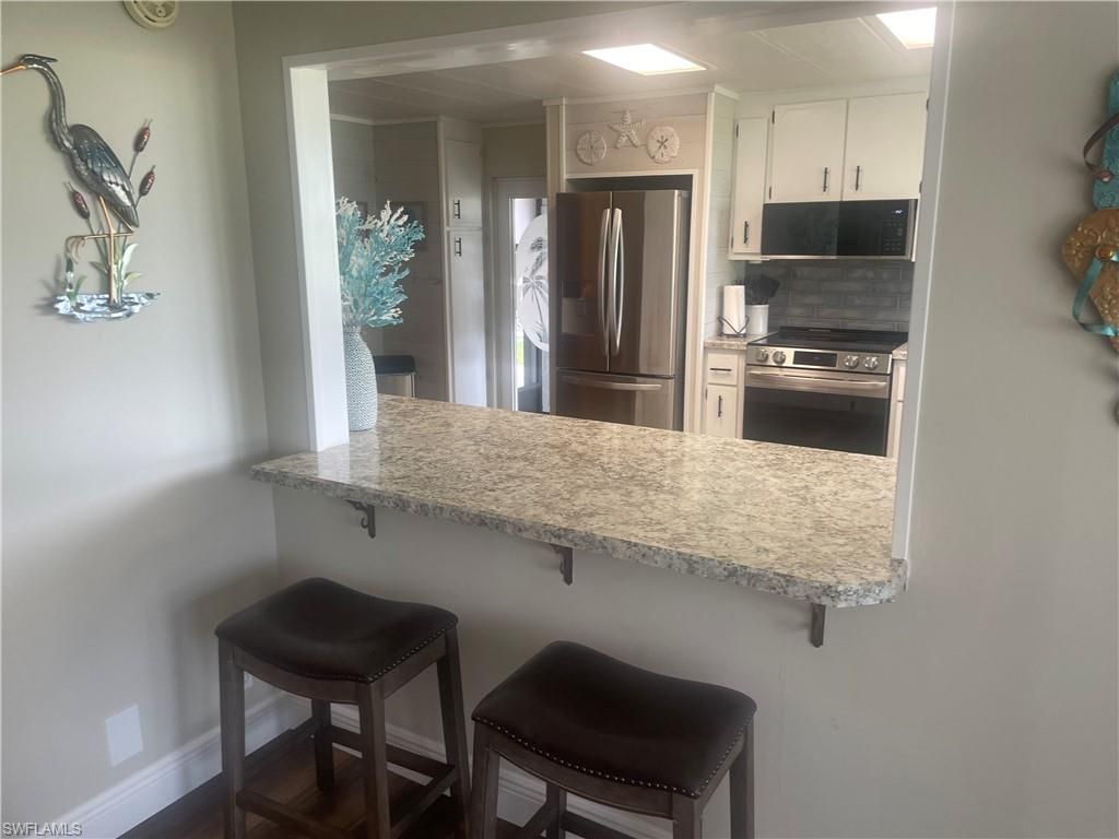 335 Nicklaus BLVD, NORTH FORT MYERS, FL 33903 — photo 2