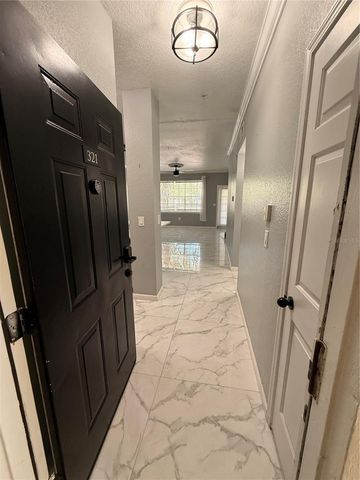 2674 ROBERT TRENT JONES DRIVE 321, Orlando, FL 32835