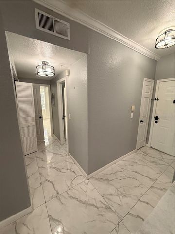 2674 ROBERT TRENT JONES DRIVE 321, Orlando, FL 32835
