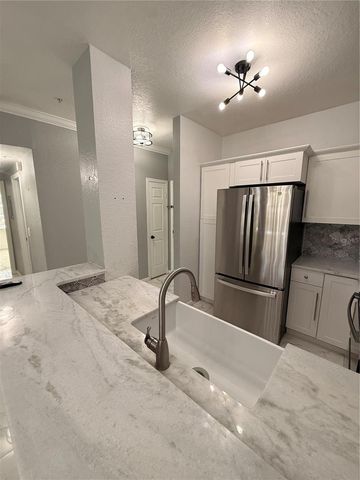 2674 ROBERT TRENT JONES DRIVE 321, Orlando, FL 32835