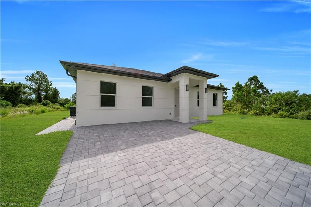 707 Randall AVE E, LEHIGH ACRES, FL 33974 — photo 2