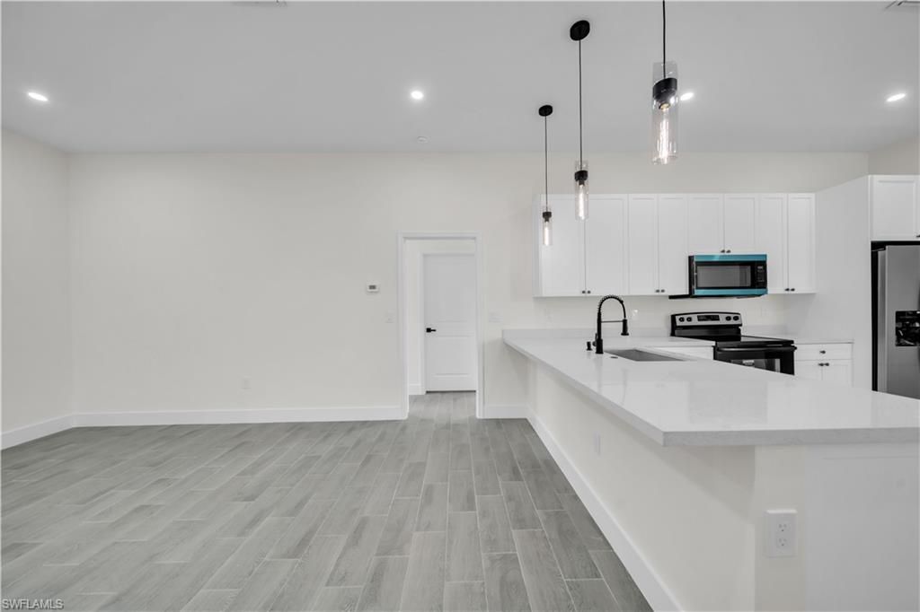 707 Randall AVE E, LEHIGH ACRES, FL 33974 — photo 5
