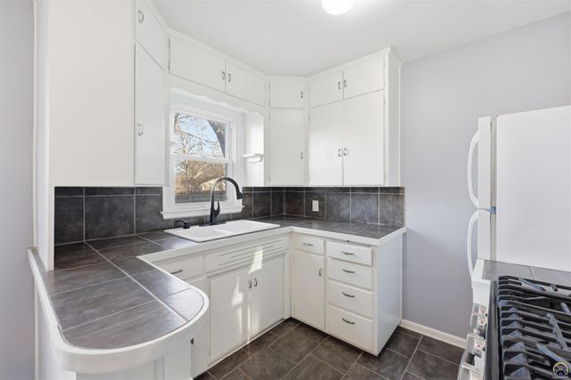 2116 SW Plass AVE, Topeka, KS 66611