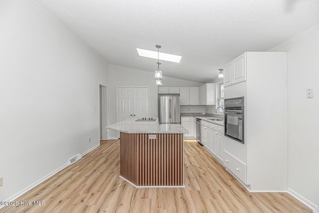 1013 Palm Court SW, Carolina Shores, NC 28467
