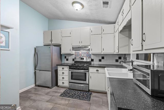 2220 Davis Oaks Court, Stone Mountain, GA 30087