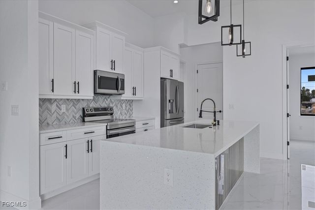 1310 NE 7th PL, Cape Coral, FL 33909