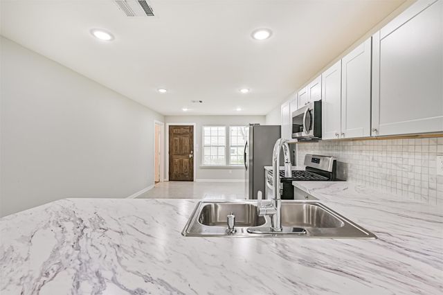 10633 Flaxman Street, Jacinto City, TX 77029