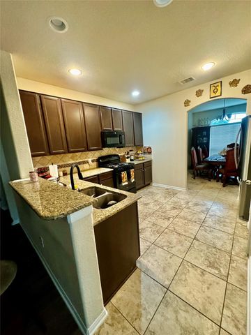 2307 Cloudy Bay Drive, Fresno, TX 77545