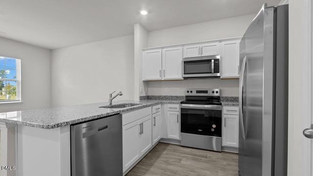 614 Ferio Court, Gibsonville, NC 27249