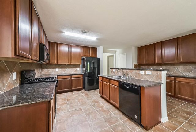 15306 Boulder Hollow Lane, Cypress, TX 77429