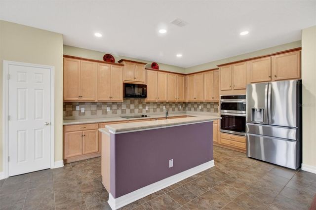 3106 ANQUILLA AVENUE, Clermont, FL 34711