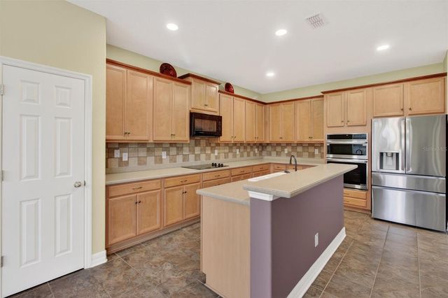 3106 ANQUILLA AVENUE, Clermont, FL 34711