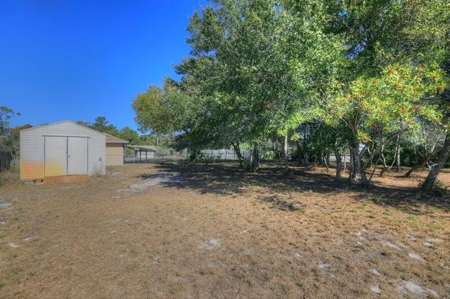 9745 Honeysuckle Drive, Micco, FL 32976