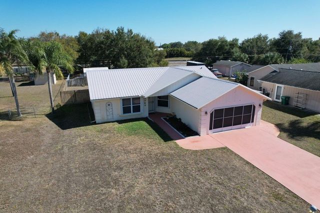9745 Honeysuckle Drive, Micco, FL 32976