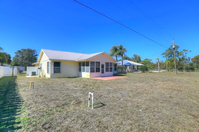 9745 Honeysuckle Drive, Micco, FL 32976