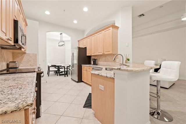 10040 Valiant CT 202, Miromar Lakes, FL 33913