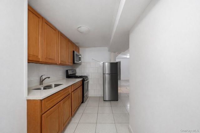 10407 94th Avenue, Ozone Park, NY 11416