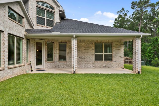 1021 Lakemont Bend Lane, Pinehurst, TX 77362