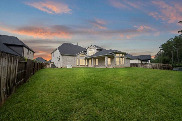 1021 Lakemont Bend Lane, Pinehurst, TX 77362