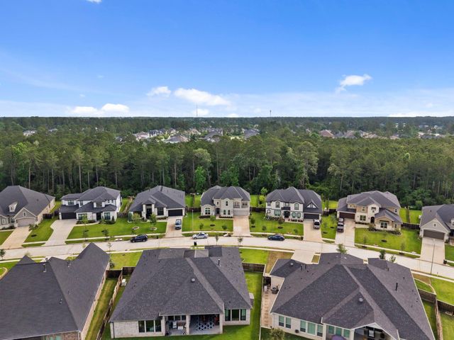 1021 Lakemont Bend Lane, Pinehurst, TX 77362