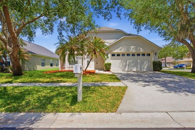 1353 CRIMSON CLOVER LANE, Wesley Chapel, FL 33543