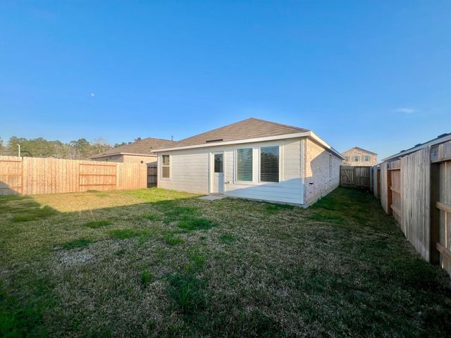 921 Lago Laceno Lane, Huffman, TX 77336