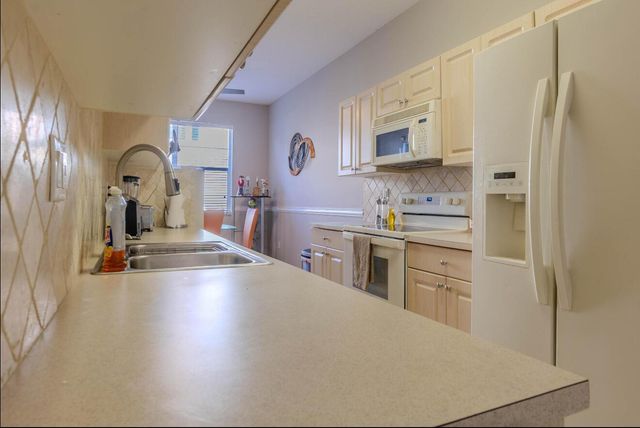 6130 Seminole Gardens Circle, Riviera Beach, FL 33418