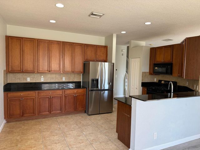 333 Berenger Walk, Royal Palm Beach, FL 33414