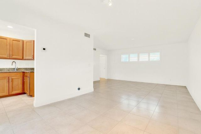 32 Colonial Club Drive 203, Boynton Beach, FL 33435