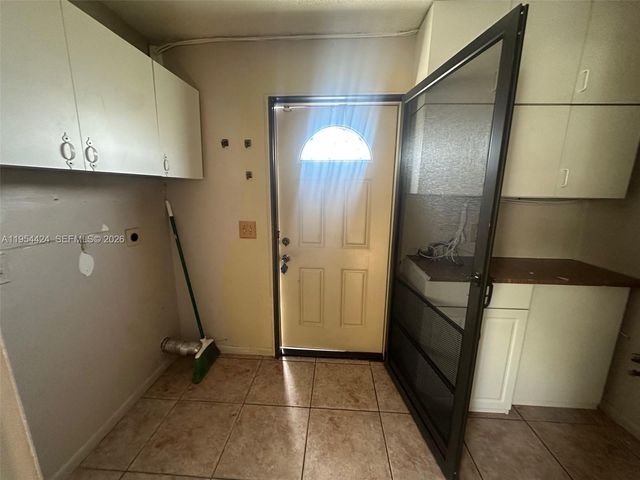 1590 Royal Forest Ct, West Palm Beach, FL 33406