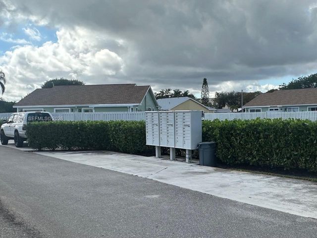 1590 Royal Forest Ct, West Palm Beach, FL 33406