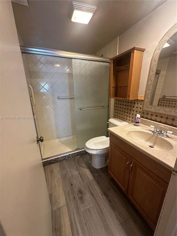 1590 Royal Forest Ct, West Palm Beach, FL 33406