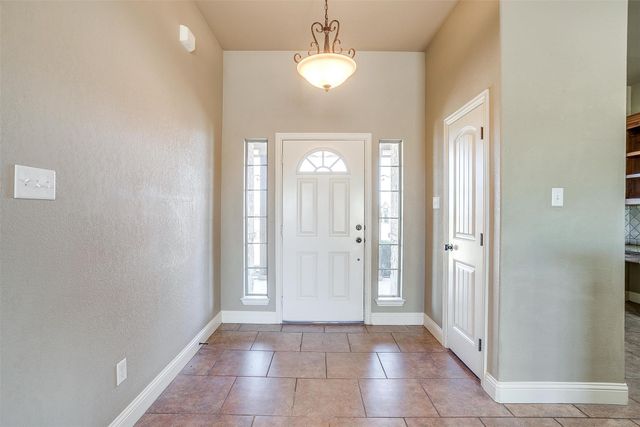 140 Champion Court, Weatherford, TX 76087