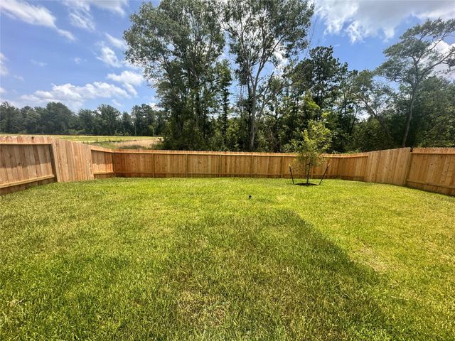 25668 Rose Creek Drive, Cleveland, TX 77328