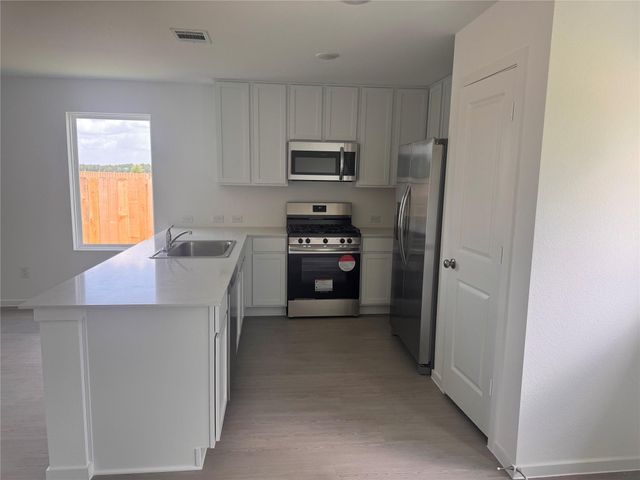 25668 Rose Creek Drive, Cleveland, TX 77328