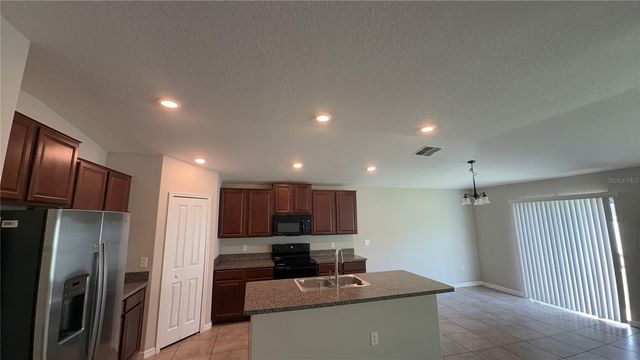 7419 ROSY PERIWINKLE COURT, Tampa, FL 33619