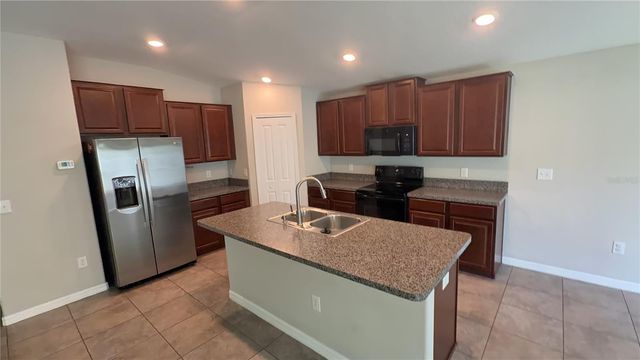 7419 ROSY PERIWINKLE COURT, Tampa, FL 33619
