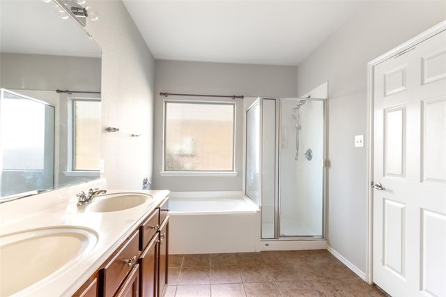 10414 Whisper Bluff Drive, Humble, TX 77396