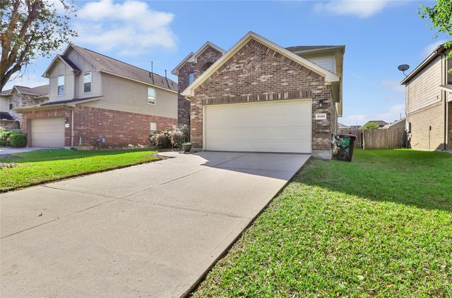 10414 Whisper Bluff Drive, Humble, TX 77396