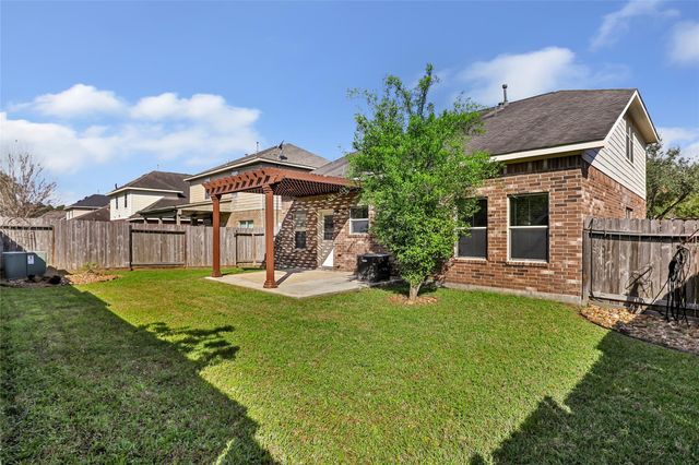 10414 Whisper Bluff Drive, Humble, TX 77396