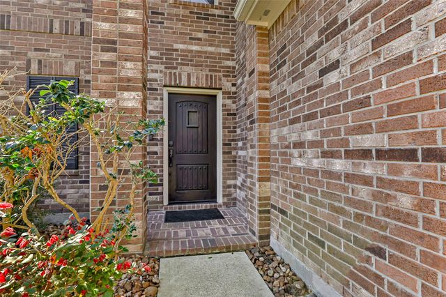 10414 Whisper Bluff Drive, Humble, TX 77396