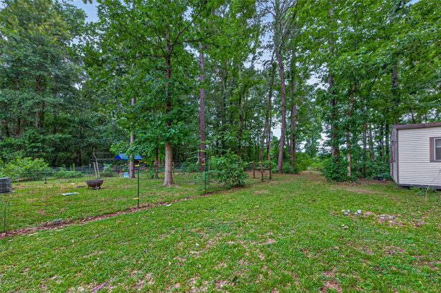 241 Quail Creek Drive, Cleveland, TX 77328