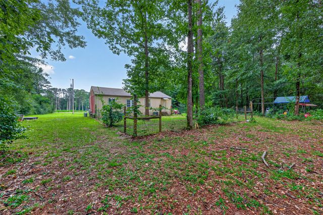 241 Quail Creek Drive, Cleveland, TX 77328