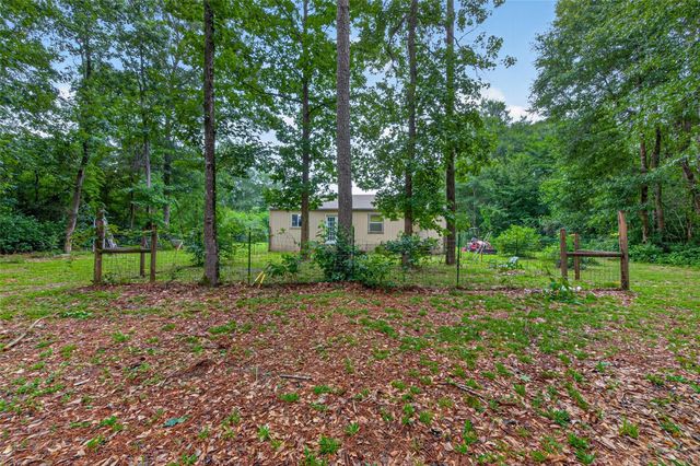 241 Quail Creek Drive, Cleveland, TX 77328