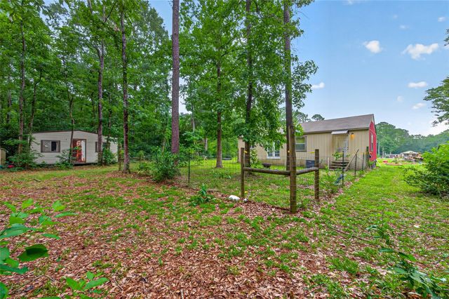 241 Quail Creek Drive, Cleveland, TX 77328